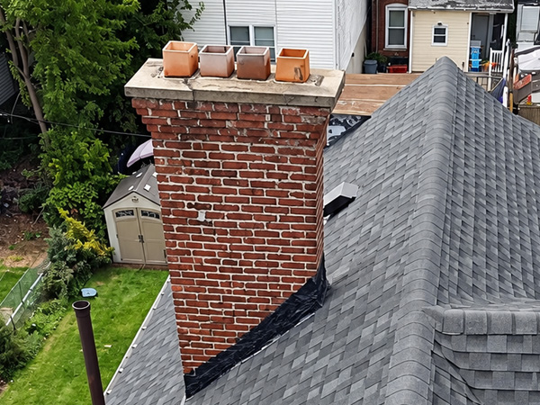 Brick chimney masonry and flashing repair for residential properties in Hunterdon County NJ