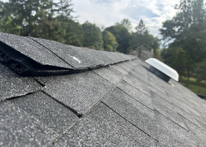 Storm damaged asphalt shingle roof repair in Englewood New Jersey